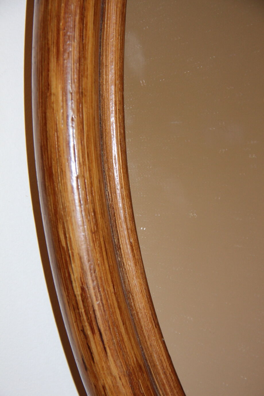 Oval bamboo mirror