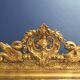 Miroir ancien à fronton XIXème bois et stuc doré