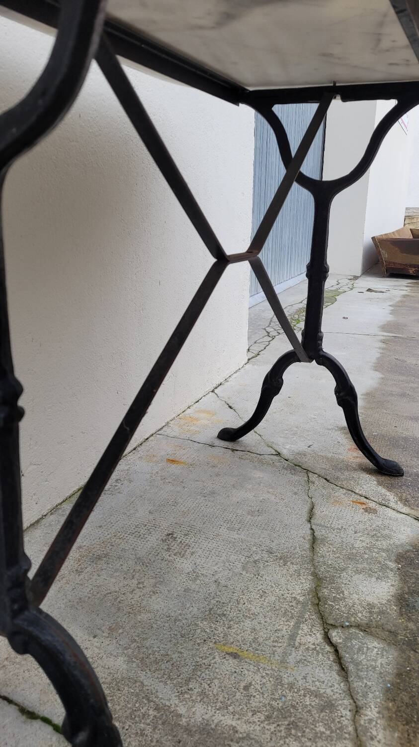 Antique cast iron bistro table with oval marble top