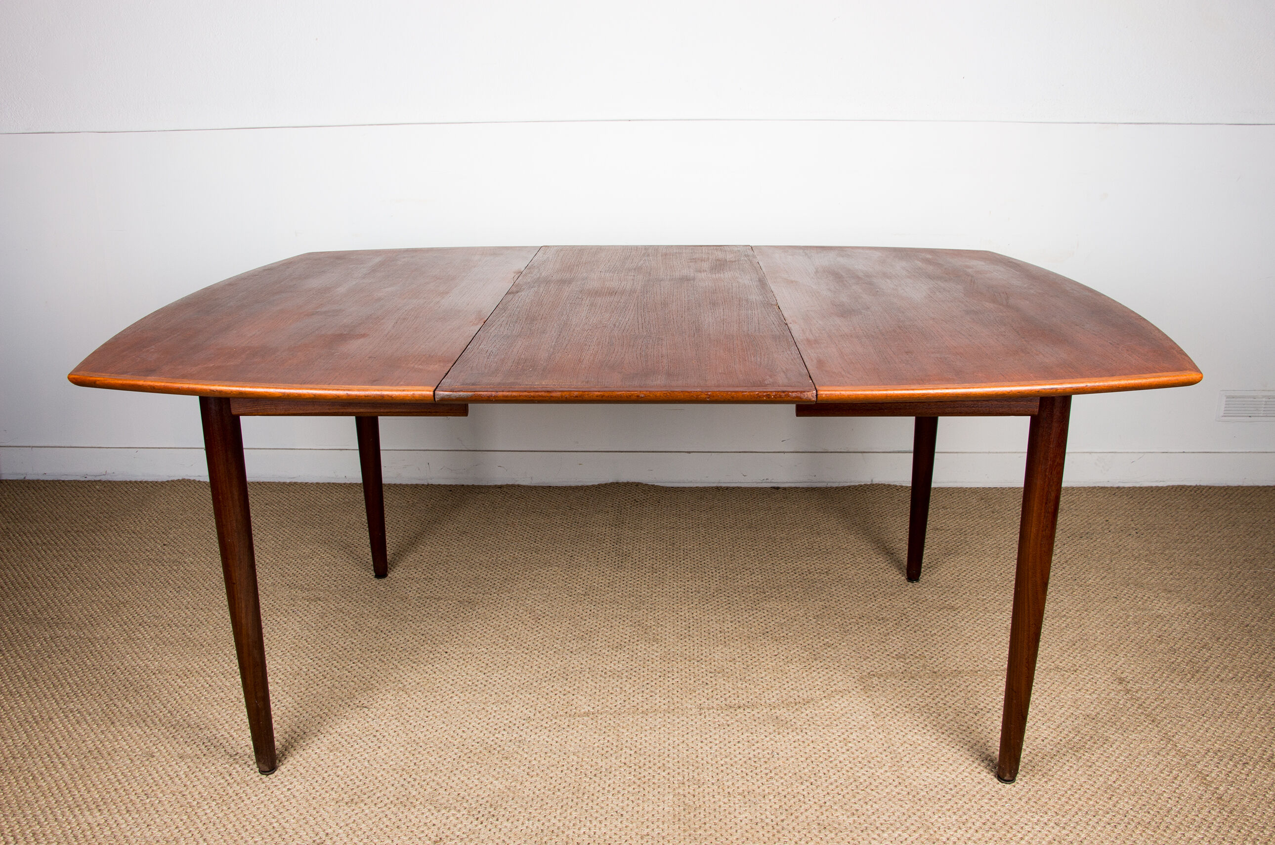 Expandable square teak dining table by Henry Walter Klein 1960