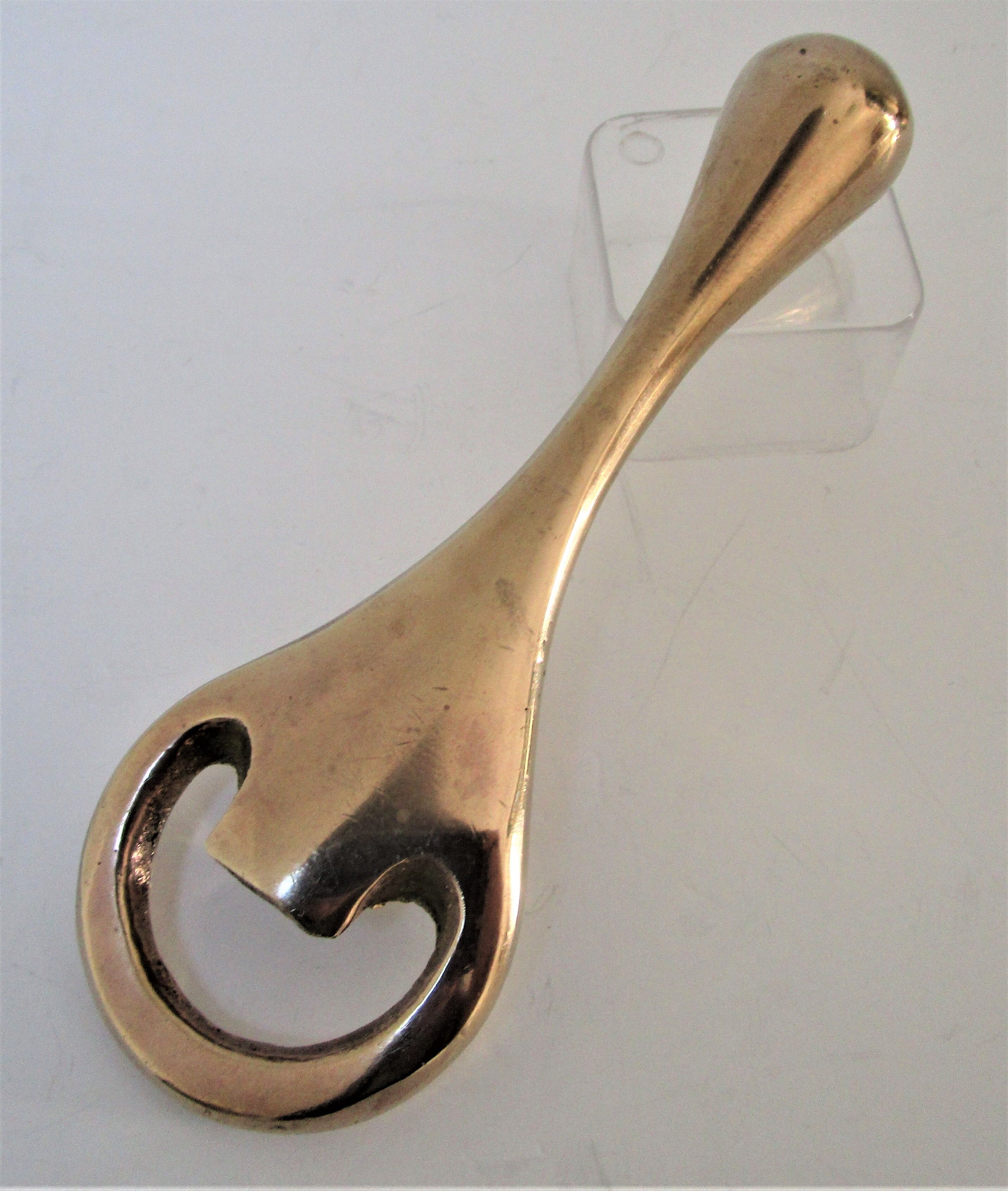 Modernist solid brass bottle opener by Carl Auböck