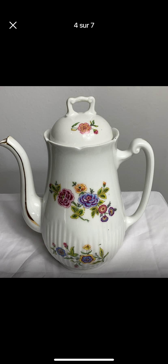 Antique porcelain teapot and sugar bowl