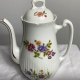 Antique porcelain teapot and sugar bowl