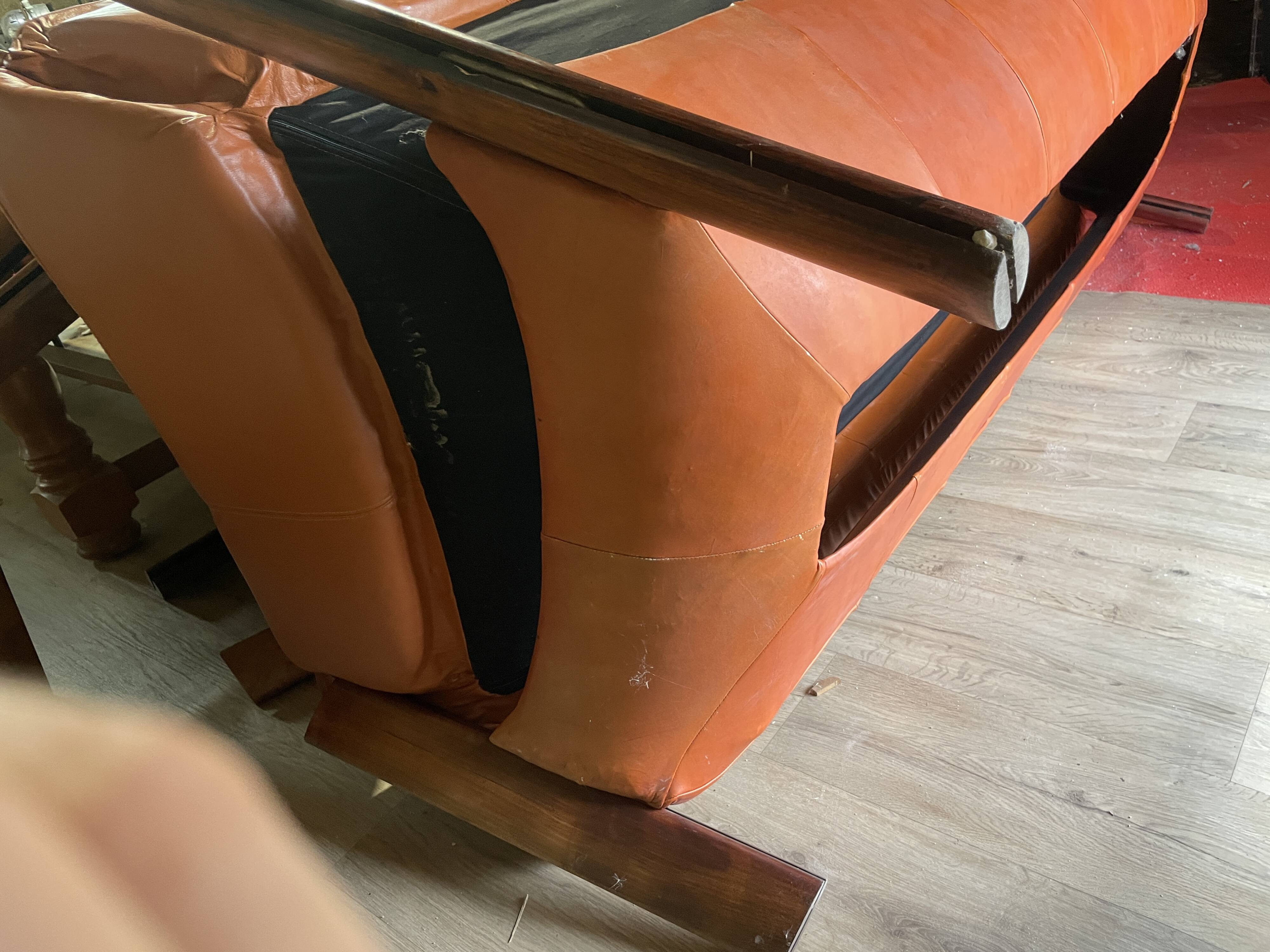 Percival lafer mp-211 sofa set with two armchairs and an ottoman in leather.