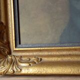 Old large wall frame in gilded carved wood