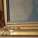 Old large wall frame in gilded carved wood