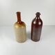 Duo de bouteille en grès moucheté et bordeaux, XXe