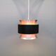 Hanging lamp,  of silver coloured aluminium with black "ring" and orange inner contrast lacquer.