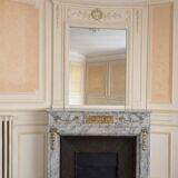 Louis XVI fireplace in veined grey marble with original gilded bronzes from the 19th century.