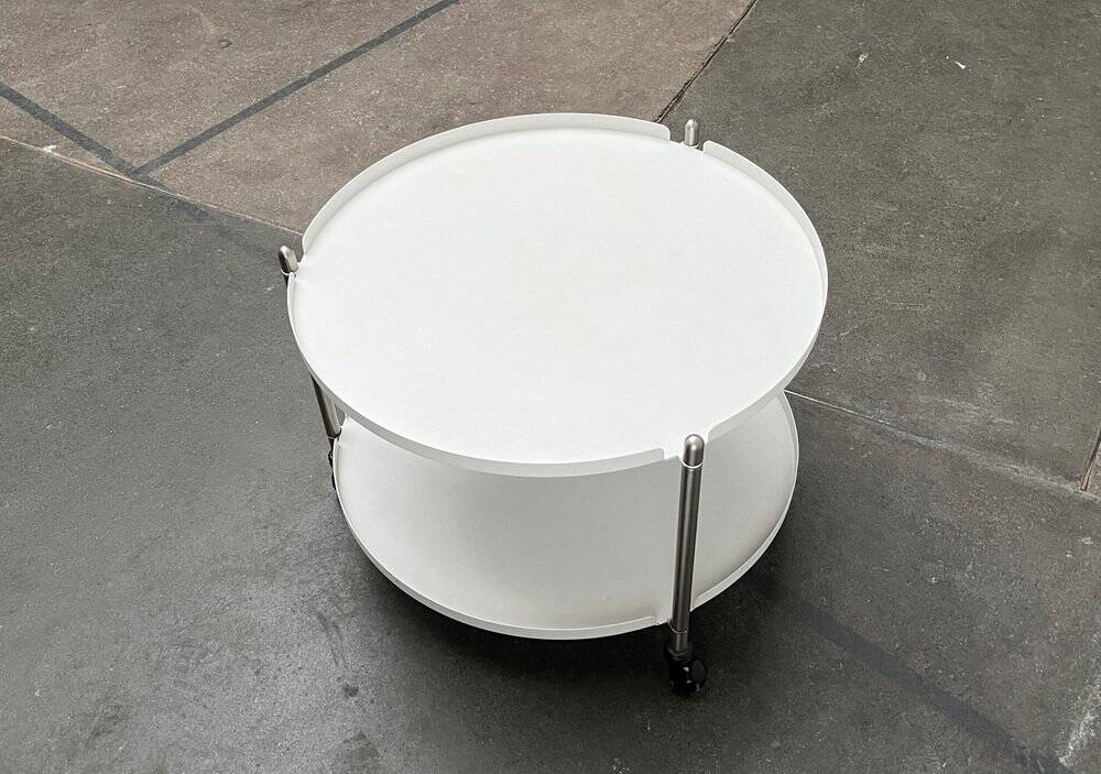 Minimalist Thrill metal coffee table or side table with wheels by Leitmotiv.