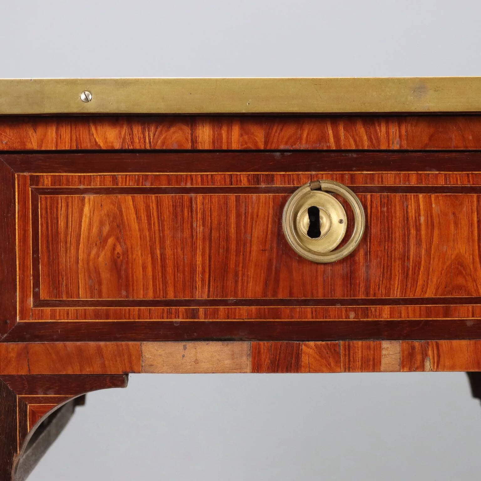 Neoclassical writing desk made of violet wood, 18th century.