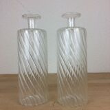 Pair of twisted glass bathroom bottle bottles