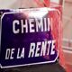 Old Enamelled and bulging "Chemin de la Rente" street plate, in perfect condition, on its cast iron support