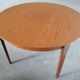 Teak round table with extension cords