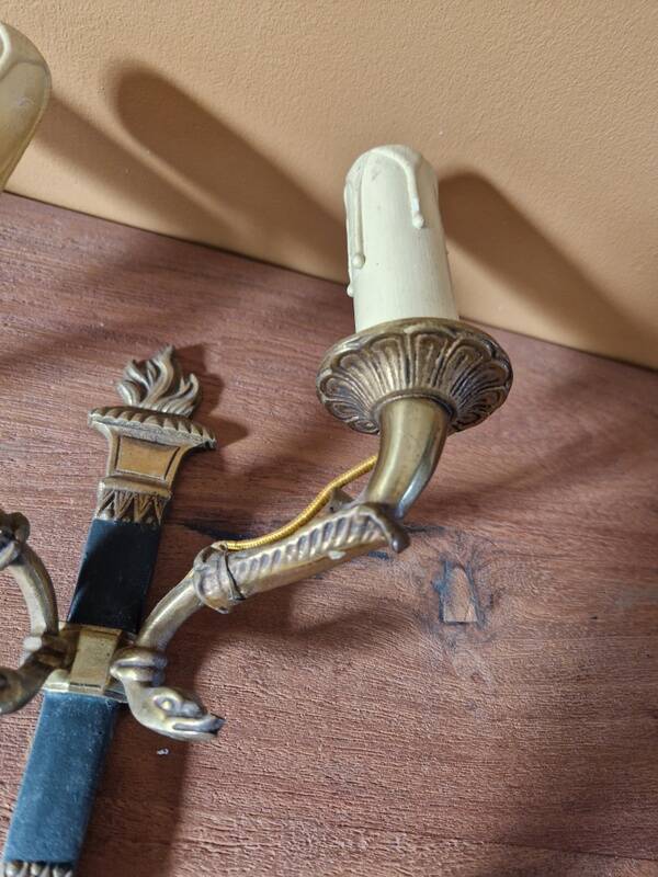 Pair of Empire-style wall sconces in gilded bronze and green lacquer.