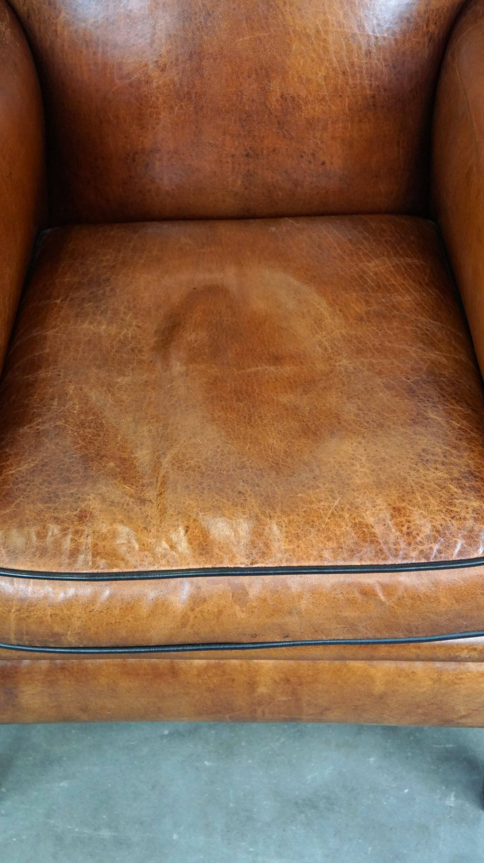Vintage sheep leather armchair/design armchair with a beautiful look