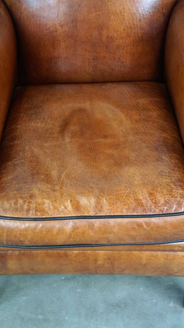Fauteuil vintage en cuir de mouton/fauteuil design avec un look magnifique