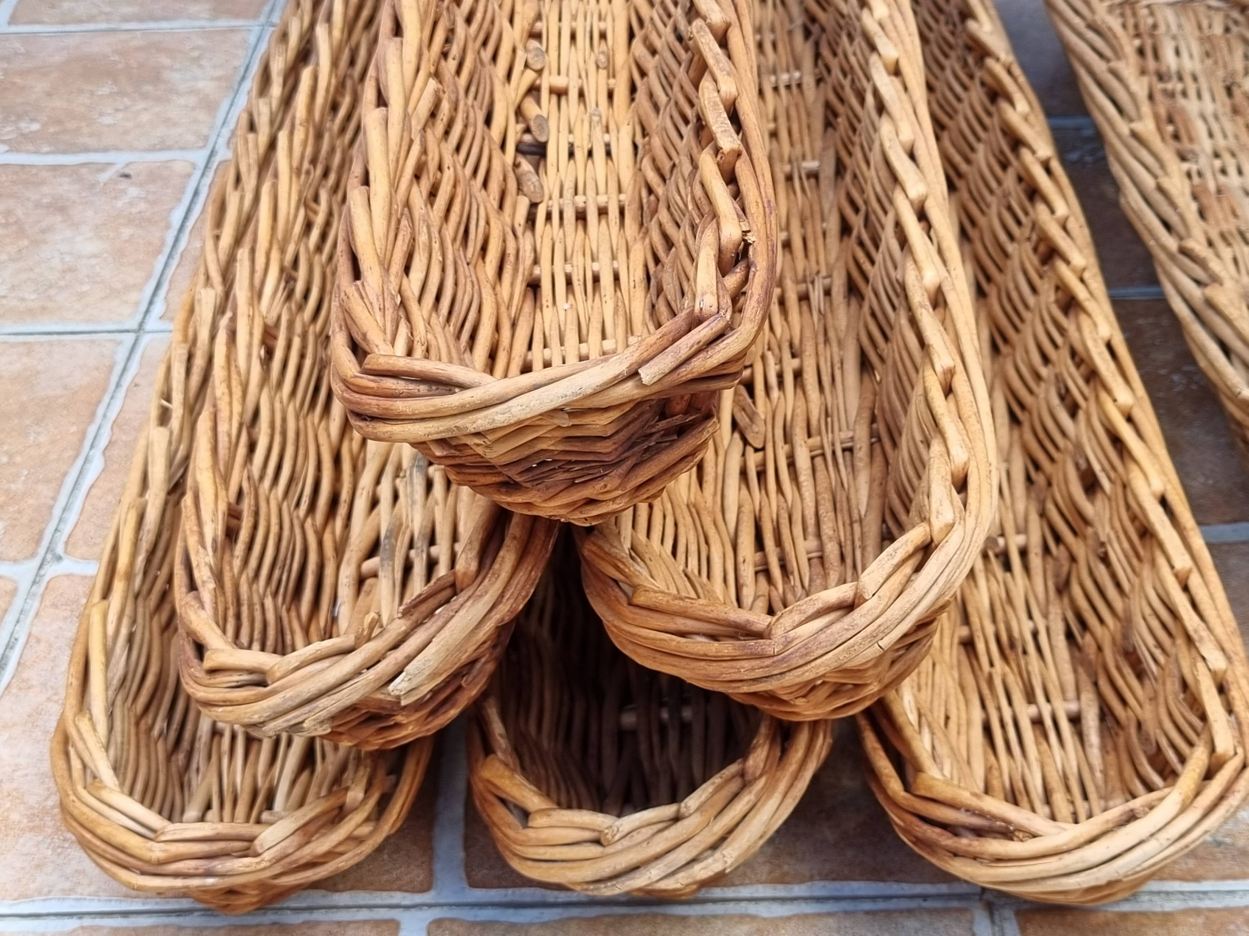 Set of 7 wicker baker's baskets, 1960s