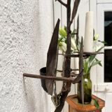 Wall lamp in wrought iron.