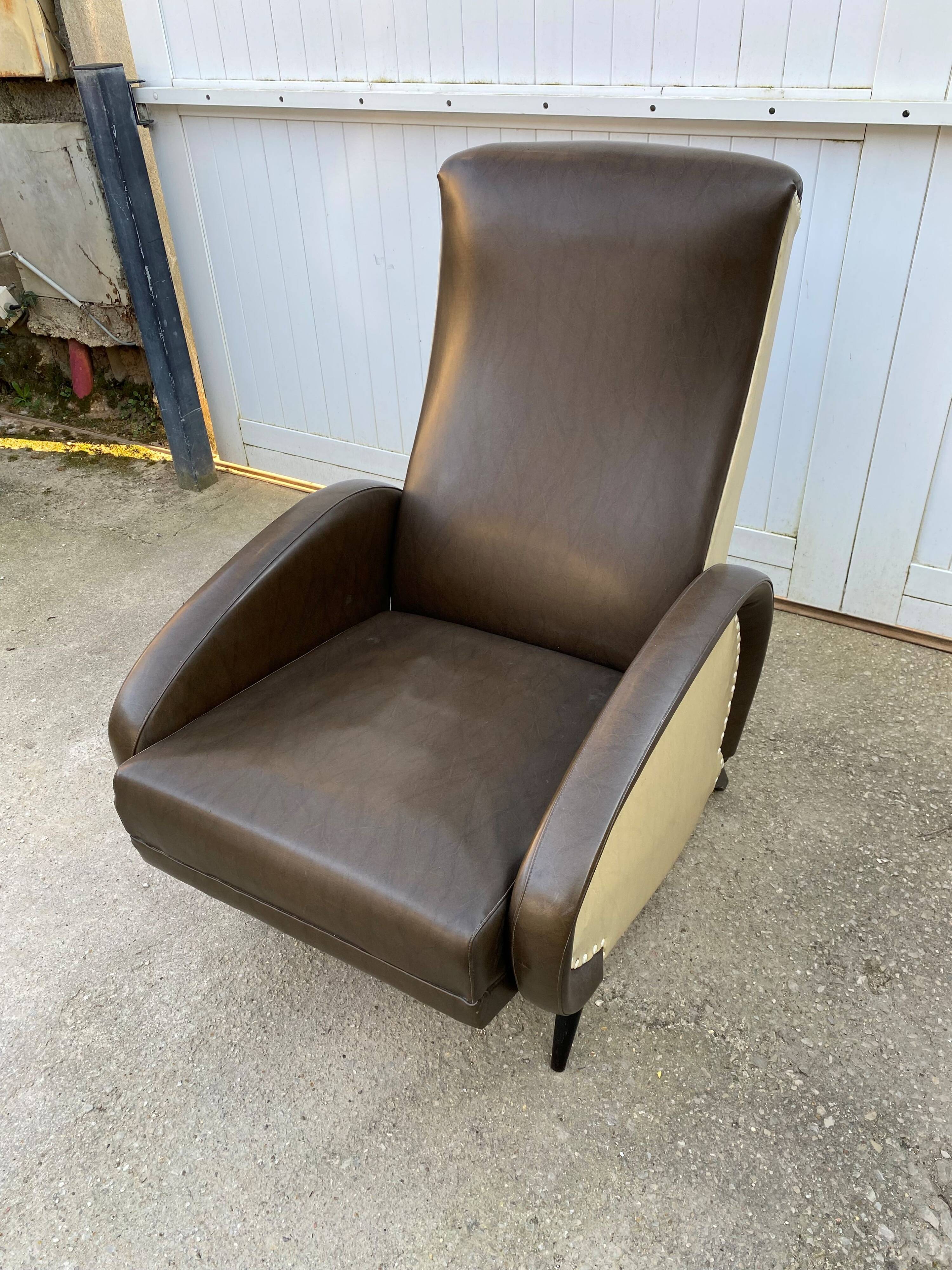 Vintage 50 faux leather reclining lounge chair with footrest
