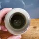 Small beige ball vase in glazed sandstone