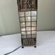 Capiz shell lamp and woven twigs