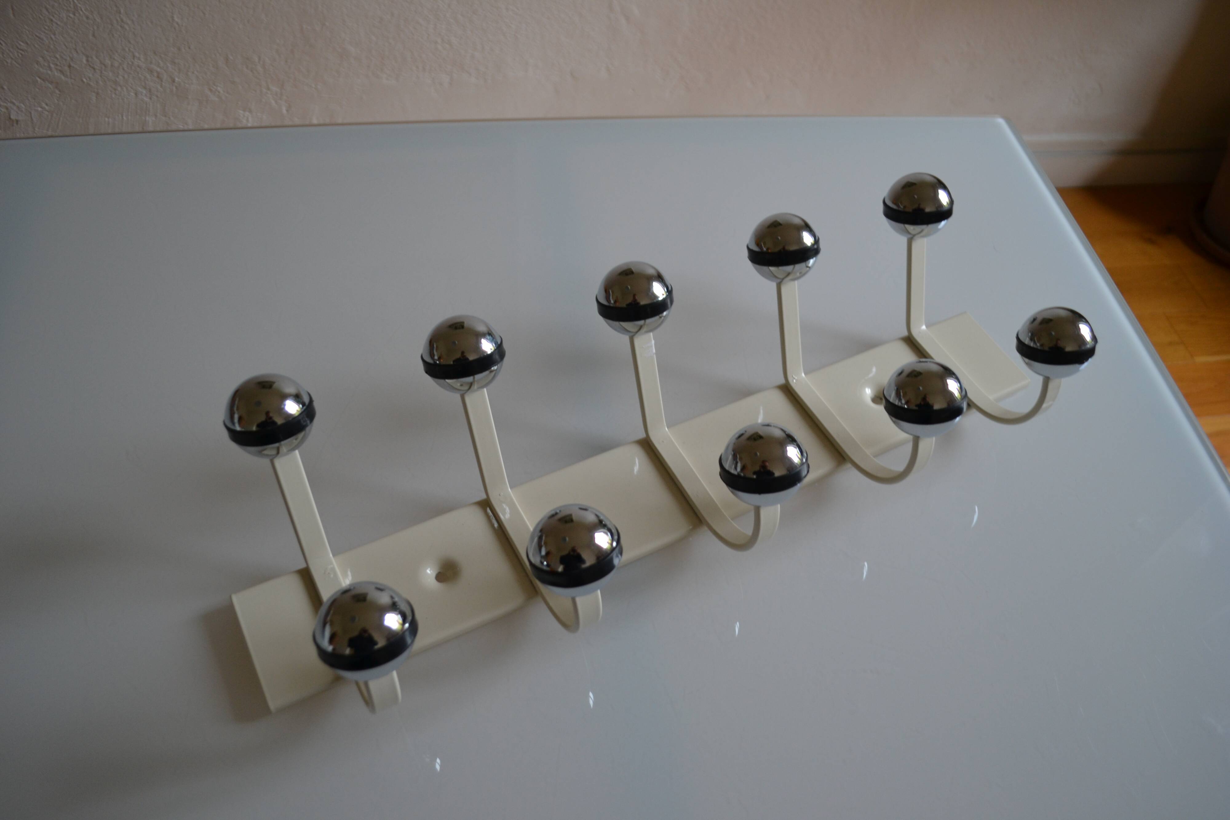 Vintage 1970s wall-mounted coat rack with 10 hooks