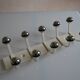 Vintage 1970s wall-mounted coat rack with 10 hooks