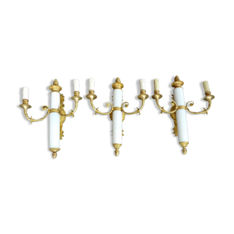Trio of Empire style wall lights in gilded bronze and white porcelain