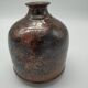 Vase bottle in sandstone pyrity