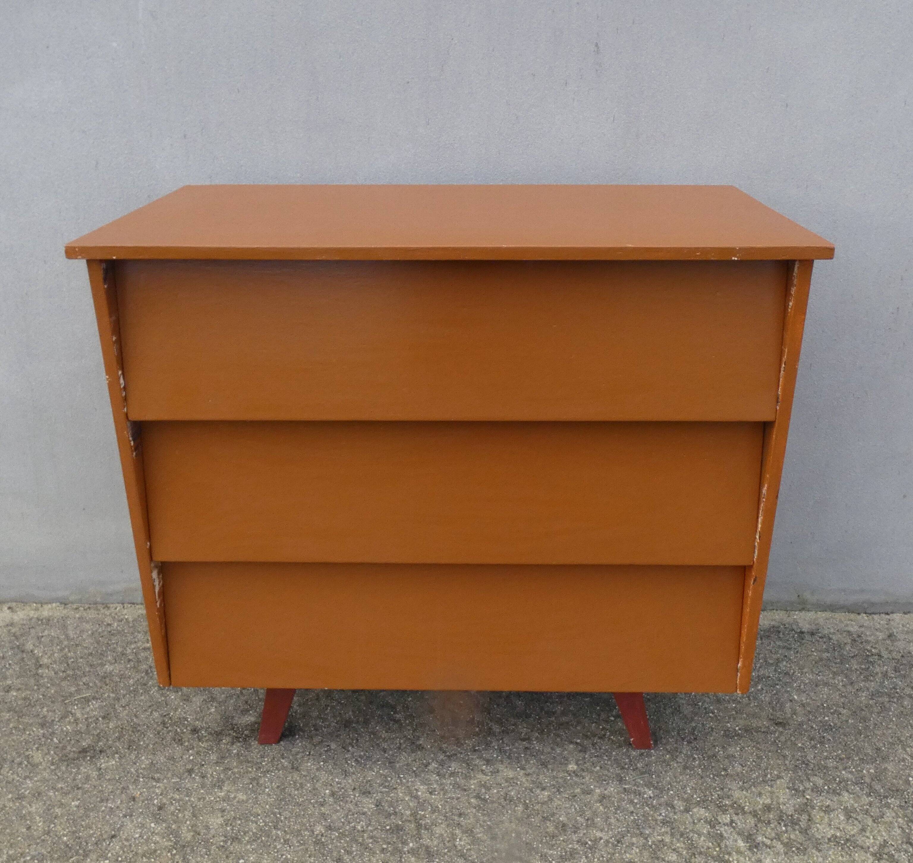 vintage wooden chest of drawers with tapered legs