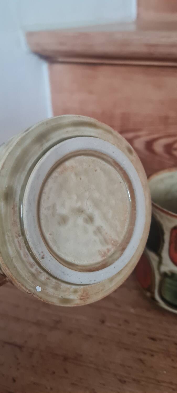 Glazed stoneware mugs from the 60s