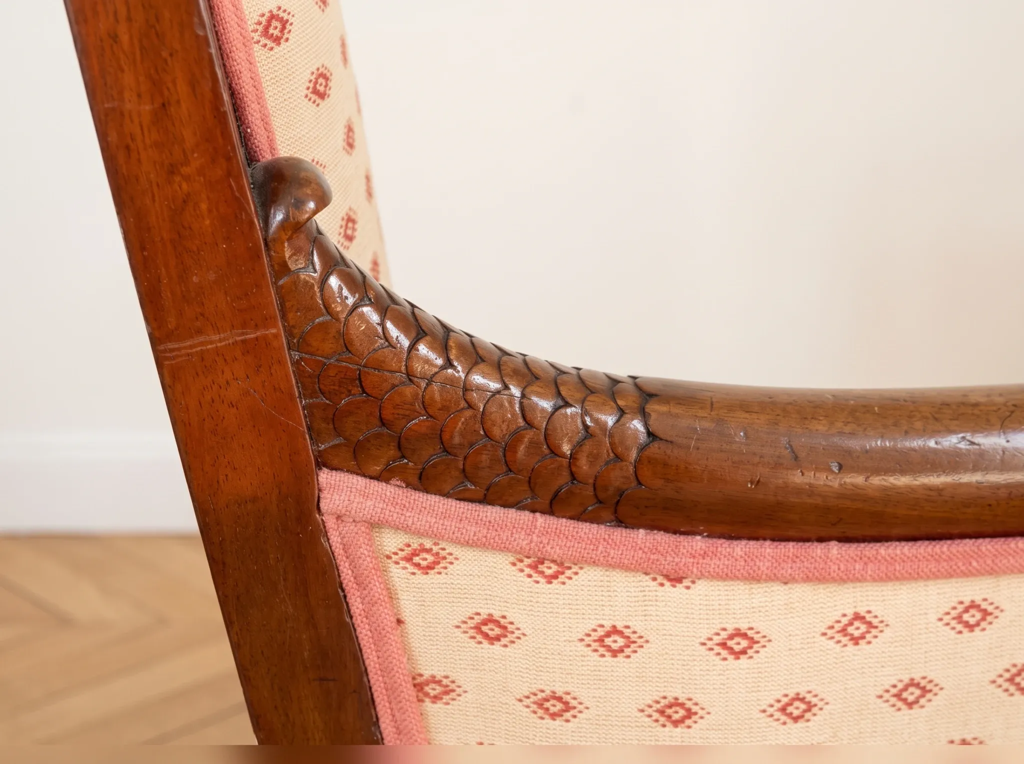 Restoration Empire period canapé bench in carved mahogany.