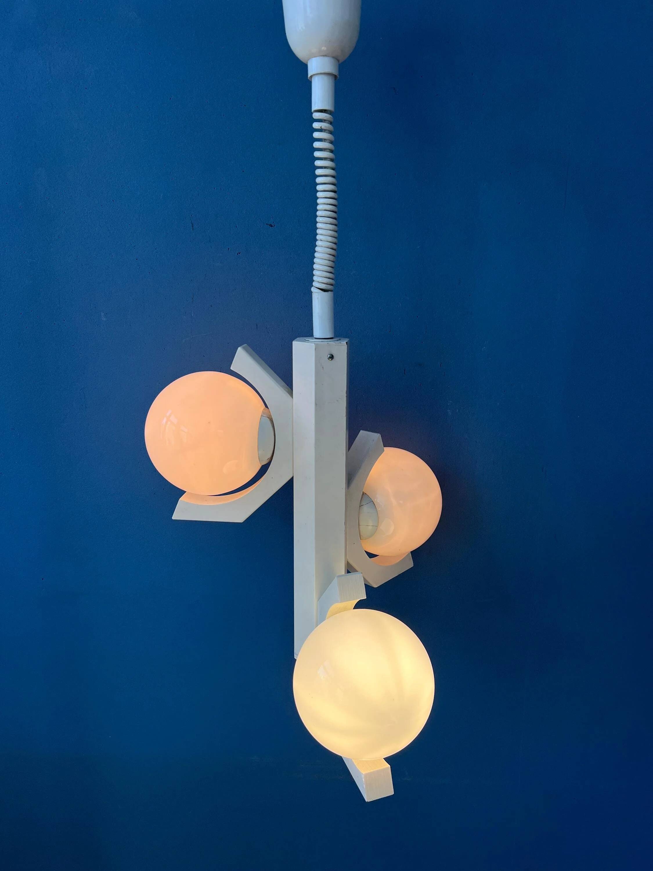 Mid-century white suspension with a bony design and opaline glass shade.