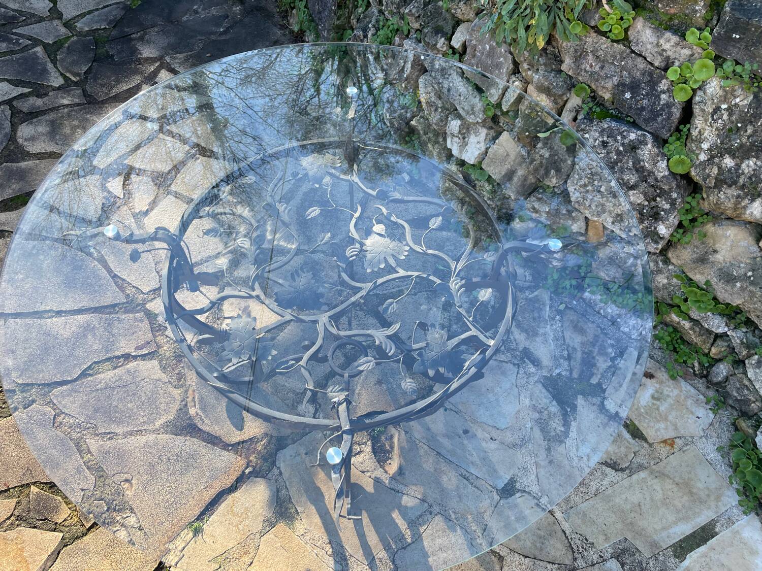 Round wrought iron table for 6 people