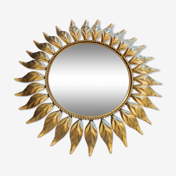 golden metal sun mirror