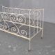 Bed in wrought iron of time end XIX painted white