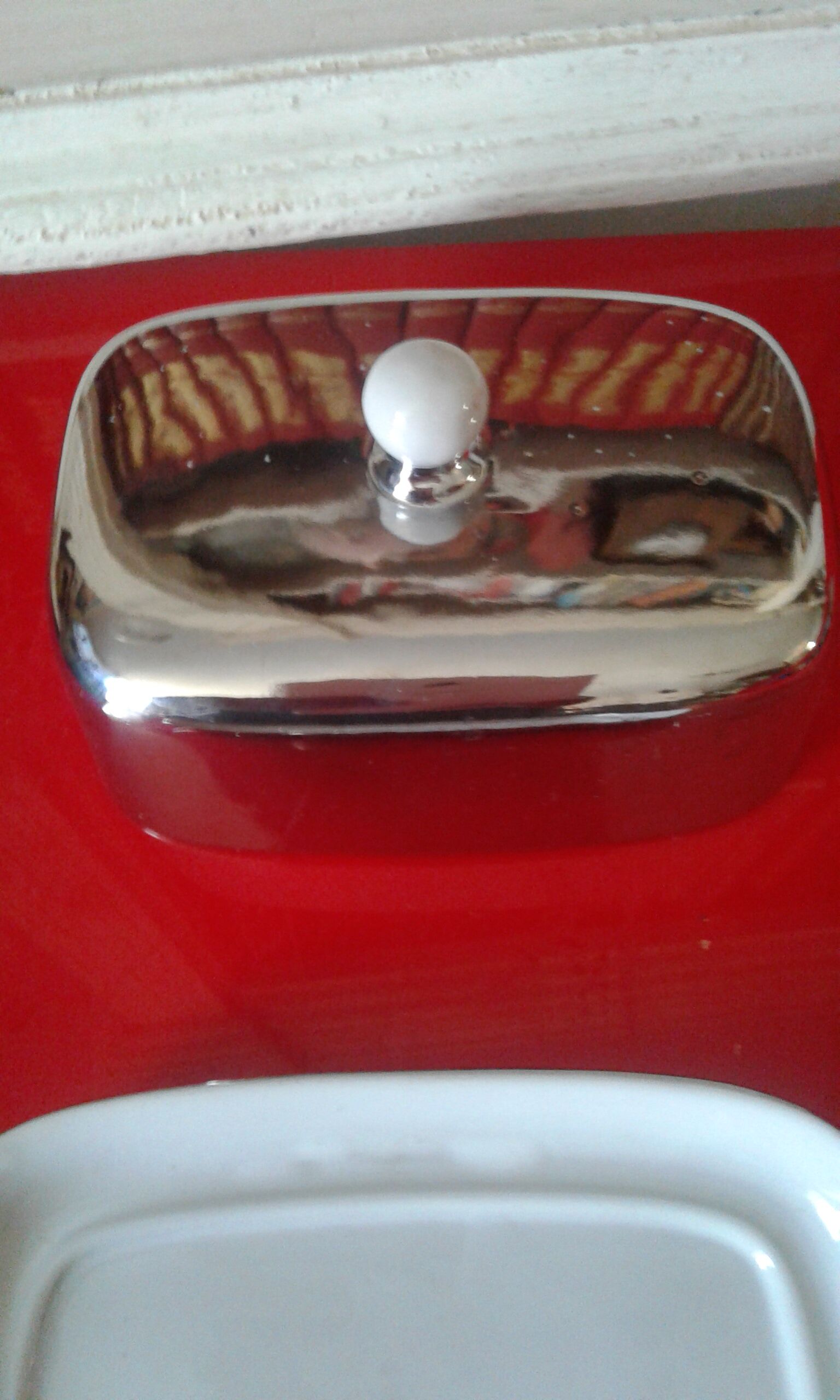 White and silver ceramic butter dish