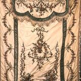 Bedspread converted into silk door with rich decorations embroidered in cinnamon, nineteenth