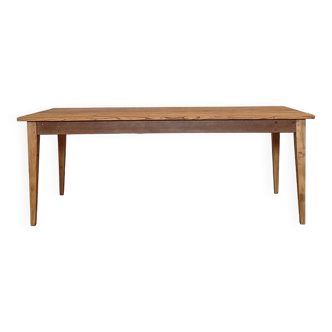 Vintage farm table with spindle legs.