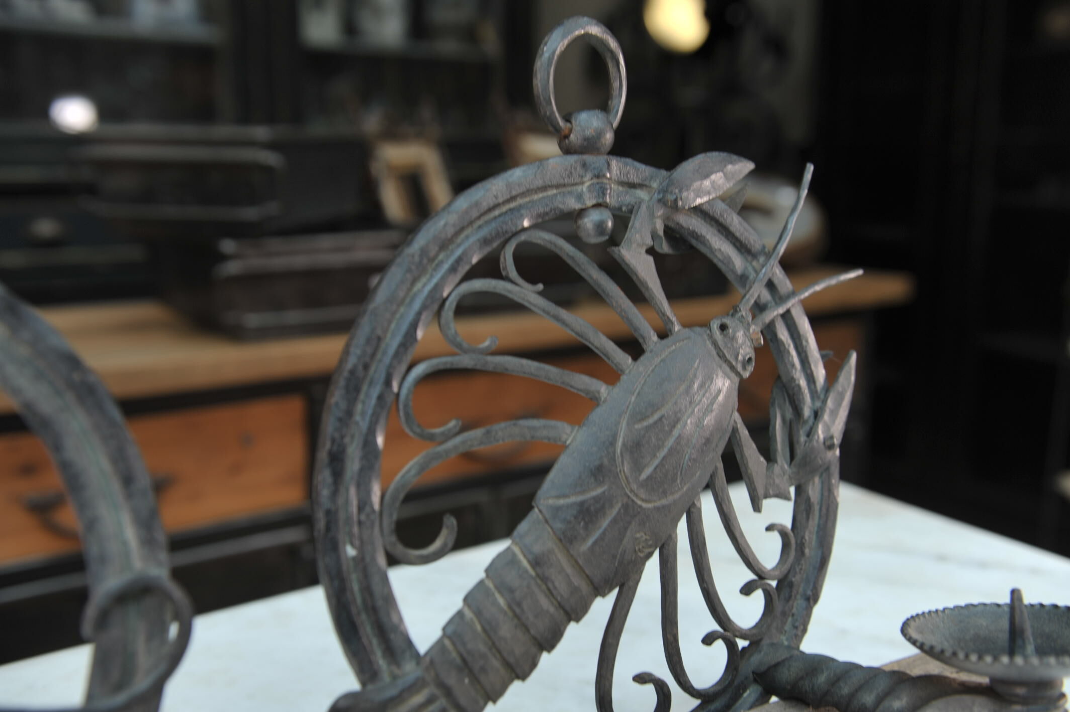 Pair of carved metal wall lamps signed RG