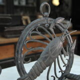 Pair of carved metal wall lamps signed RG