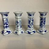 Four candlesticks with blue patterns