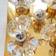 Brass wall lamp with glass prisms