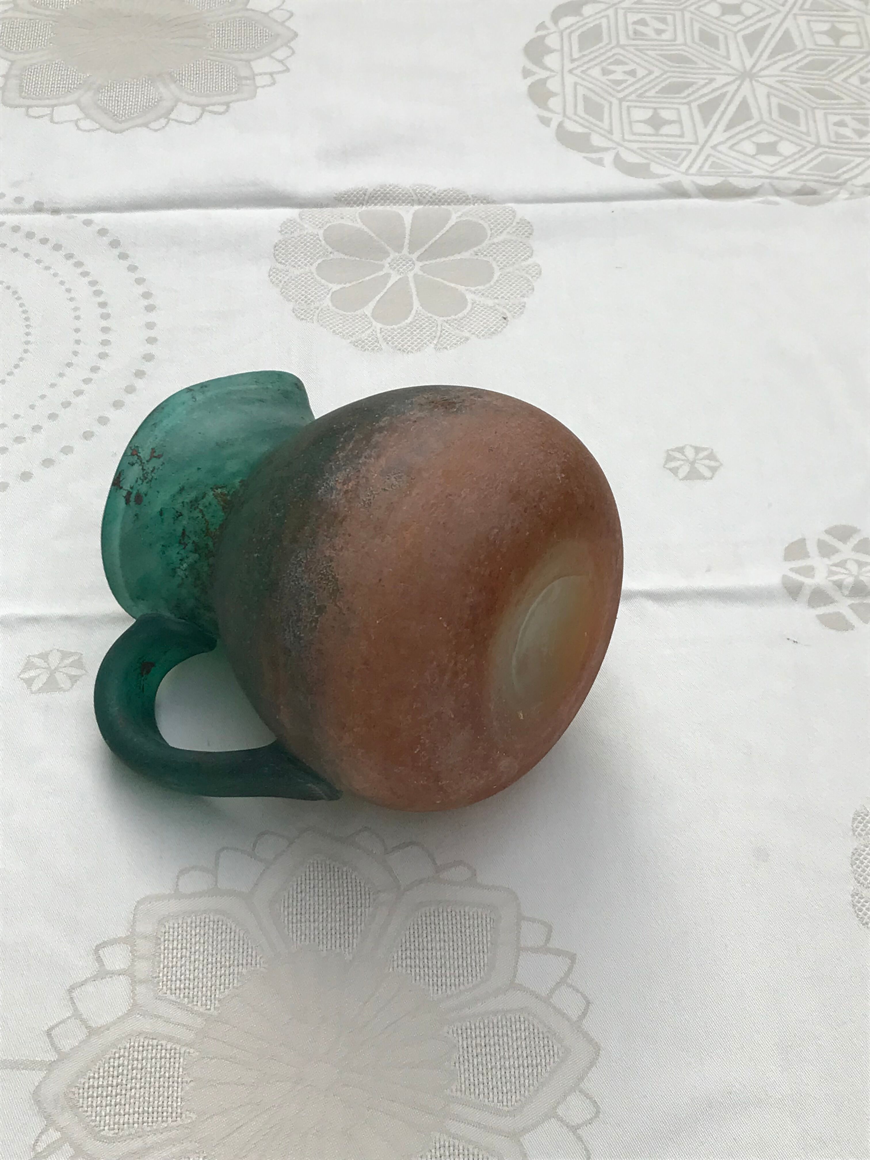 Orange and green glass paste pitcher by Georges DE FEURE