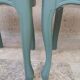 Antique chairs with studded upholstery.