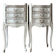 A pair of distressed bedside tables.