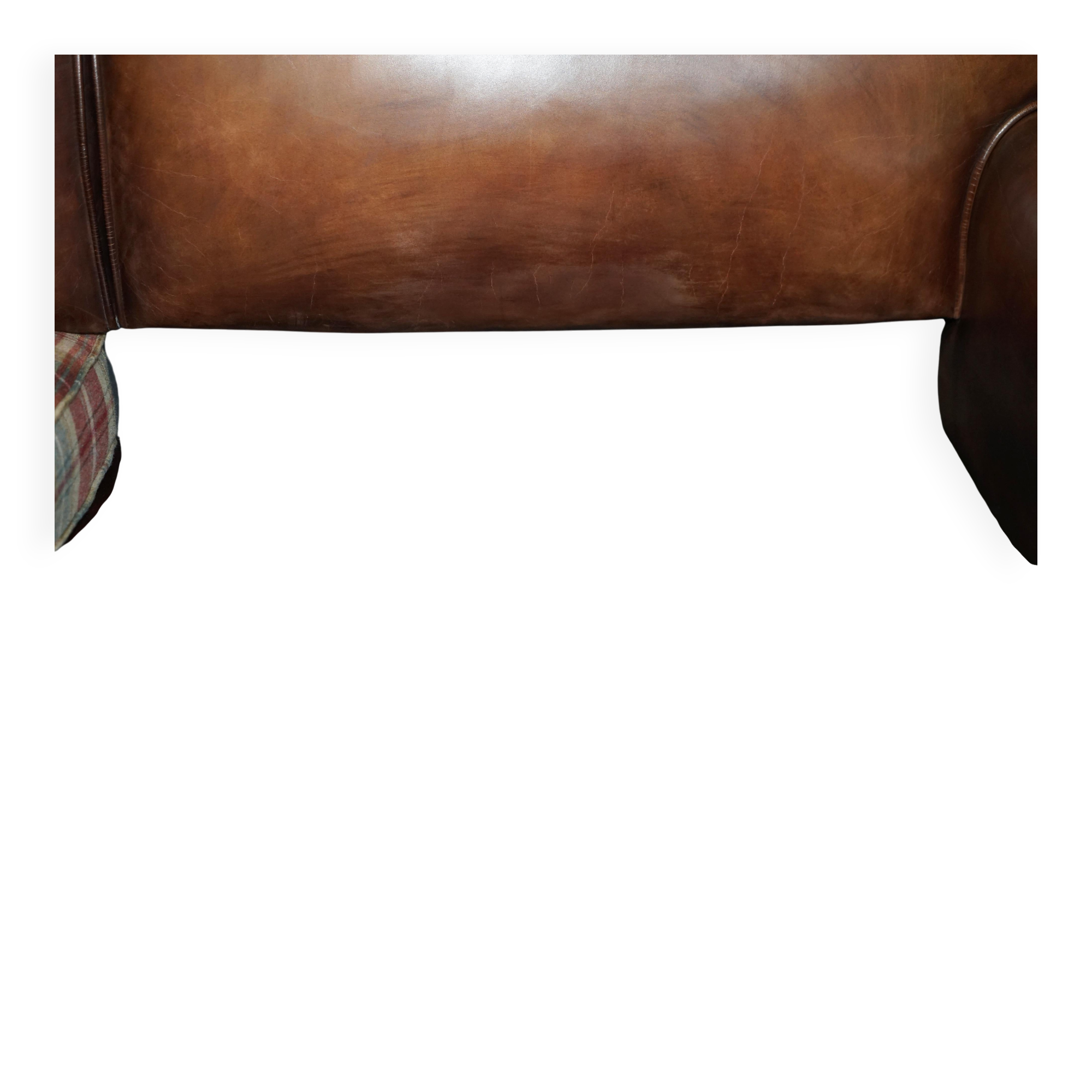 George Smith Signature Scroll leather canapé with tartan Scottish wool cushions.