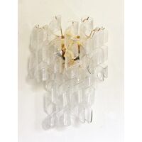 A pair of transparent “ricci” murano glass wall sconces