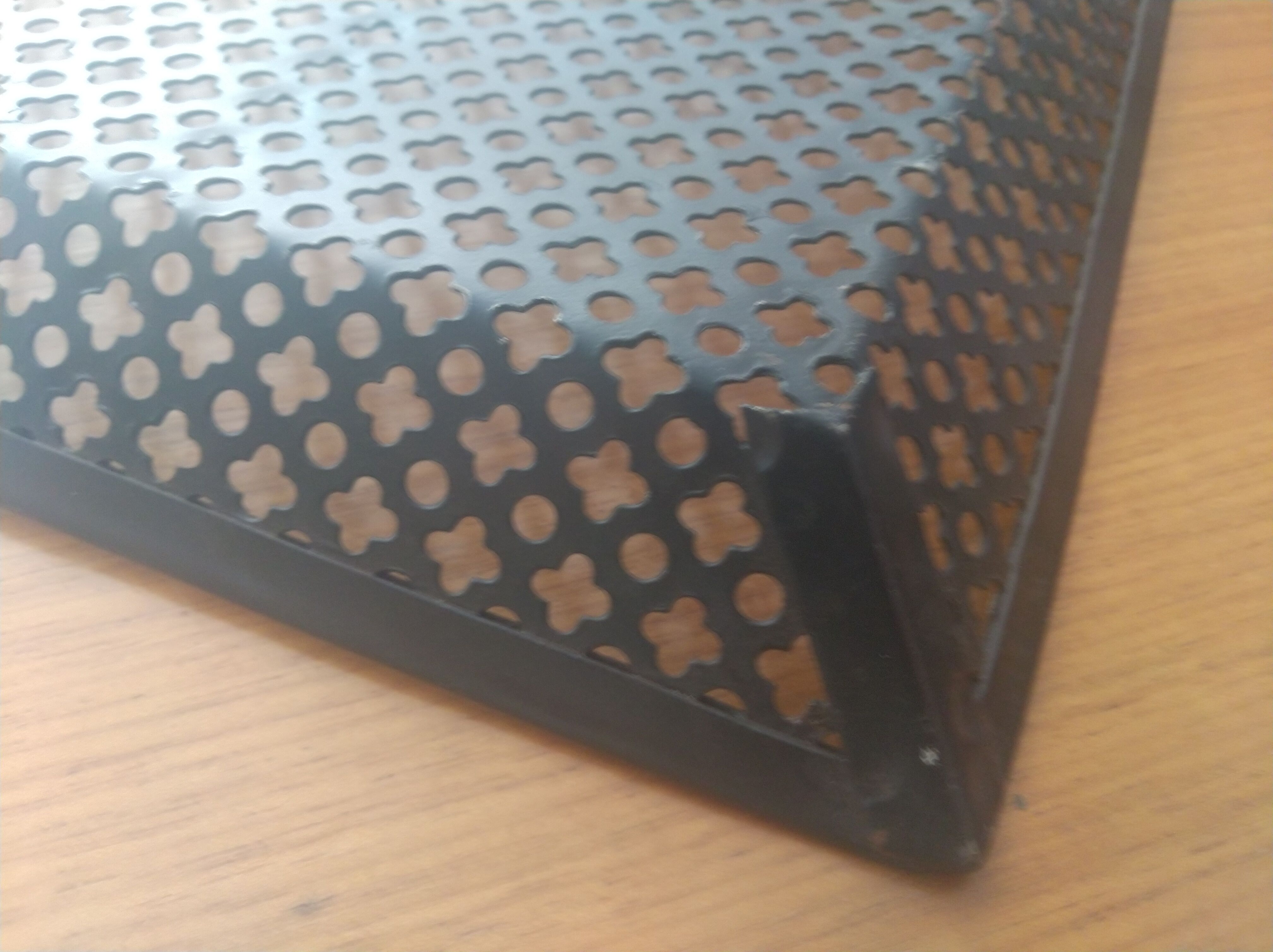 Perforated sheet metal tray, circa 1950